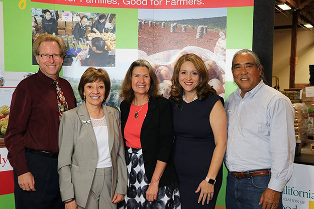 Mark Lowry, Director of the Orange County Food Bank, Secretary Karen Ross of CDFA, Sue Sigler, Executive Director of the California Association of Food Banks, Nicole Suydam, CEO of Second Harvest Food Bank of Orange County, and AG Kawamura, Co-owner of O.C. Produce and former California Secretary of Food and Agriculture