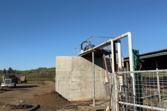 Manure collection pit and screw press separator installed as part of the AMMP project.