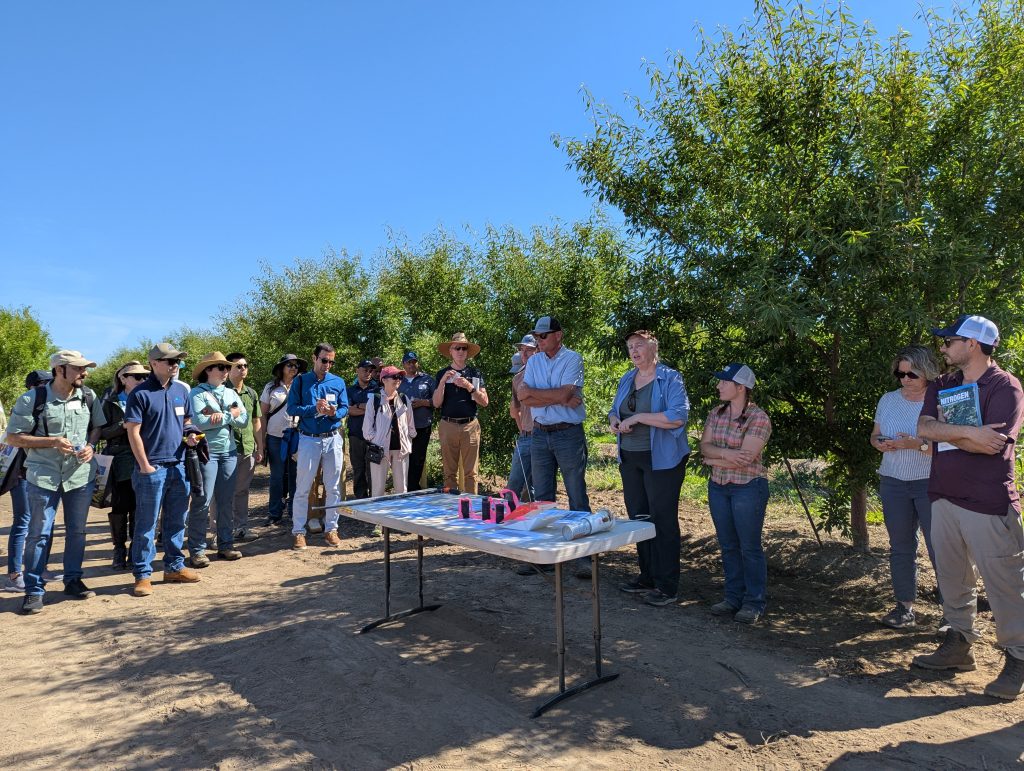 State and industry representatives visit Bowman Orchards.