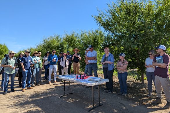 State and industry representatives visit Bowman Orchards.